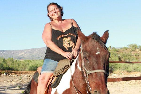 Lori horseback riding